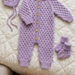 Lavender honeycomb baby sleeper set with romper, bonnet, and booties