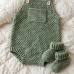 Sage green moss stitch baby romper with booties