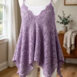 Lavender dream lace overlay top in soft lilac on a dress form