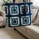 Ocean blue granny square tote with navy leather handles