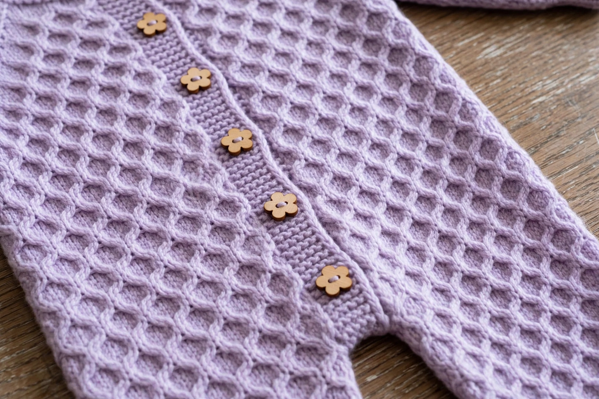 Honeycomb puff stitch texture swatch in lavender yarn