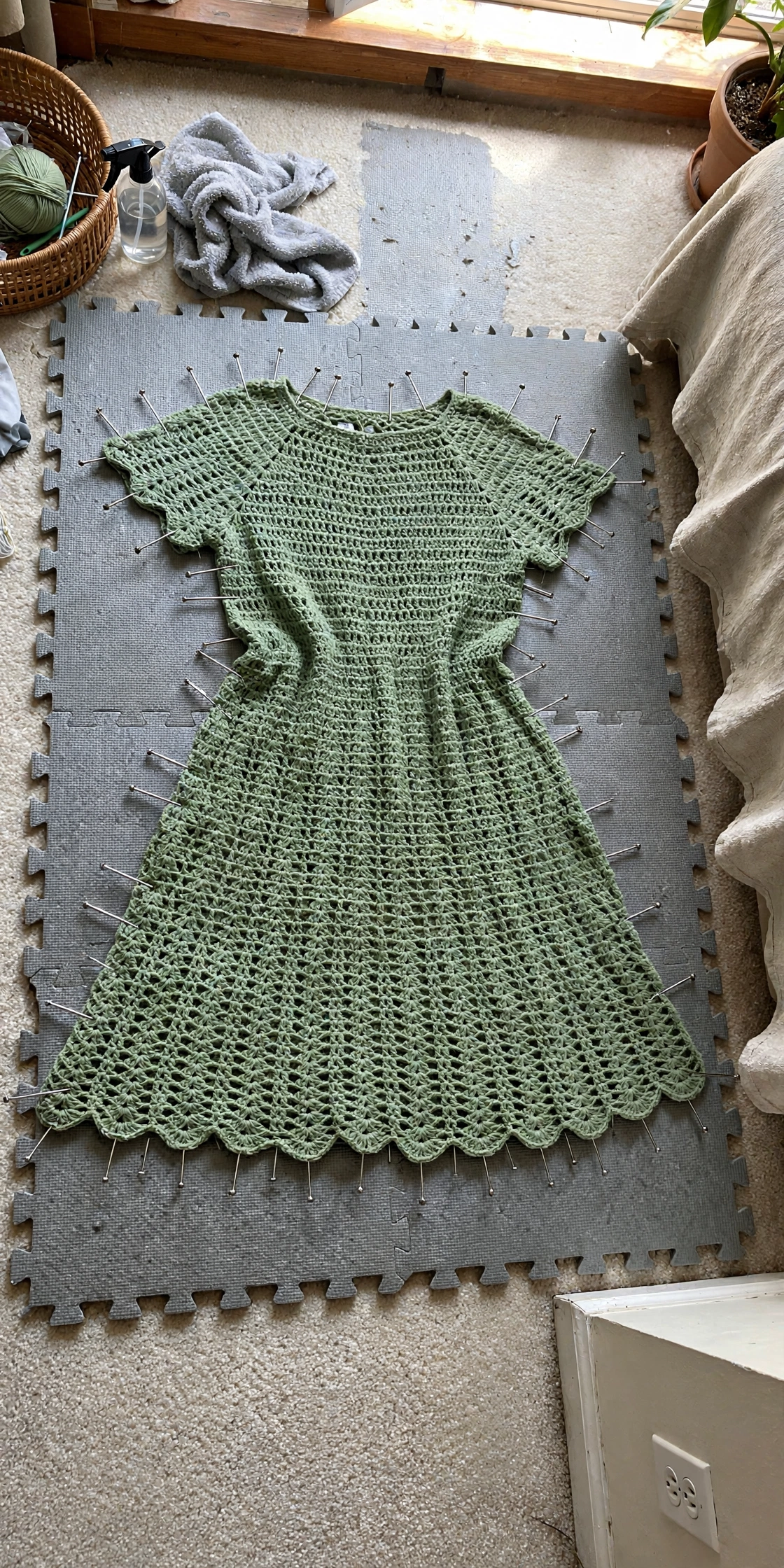 Sage green ribbed dress finishing